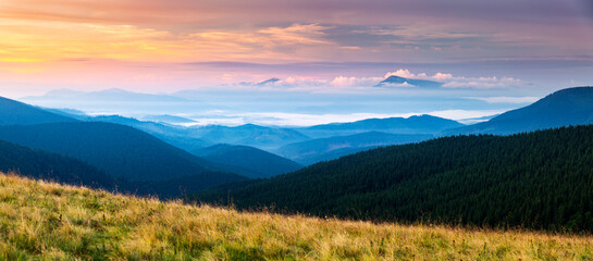 An incredible scene of dawn over the mountain ranges. Carpathian mountains, Ukraine, Europe.