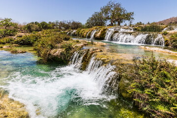 Wadi Darbat (The Darbat Valley) is the most beautiful and scenic spot with waterfalls in Dhofar Region in Sultanate of Oman