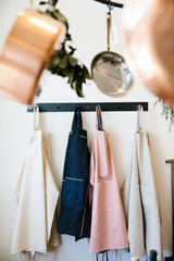 aprons hanging in kitchen