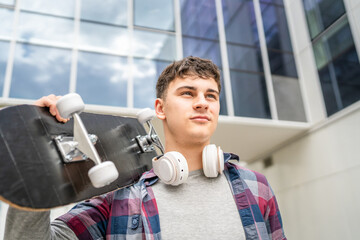 portrait of young Caucasian man teenager 18 or 19 years old outdoor