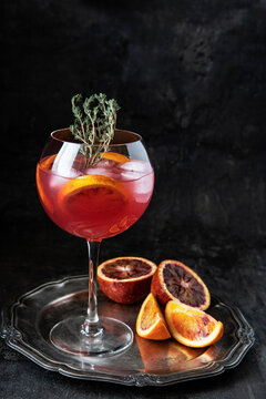 Glass of alcoholic drink  or cocktail (Margarita or Daiquiri)  on  dark background