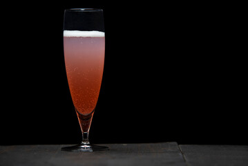 A glass of delicious craft beer served on an authentic beer glass, to be used as a background