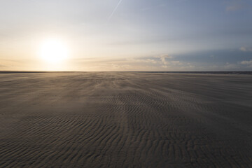 Obraz na płótnie Canvas Sonnenuntergang am Strand auf Langeoog