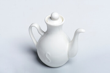 White soy sauce or vinegar ceramic pot isolated on white background