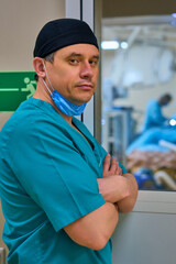 Fototapeta na wymiar surgeon is standing near the operating room