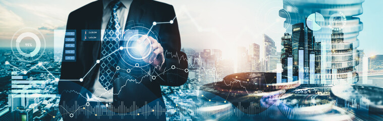 Businessman analyst working with digital finance business data graph showing technology of investment strategy for perceptive financial business decision. Digital economic analysis technology concept.
