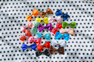 Black dot background and various colored ribbons