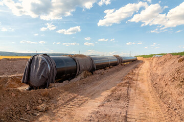 Construction of an industrial gas pipeline (oil), leading by nature - 595702927