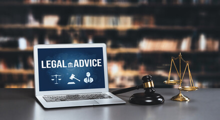 Smart legal advice website for people searching for astute law knowledge in laptop computer on a desk in library of university or college