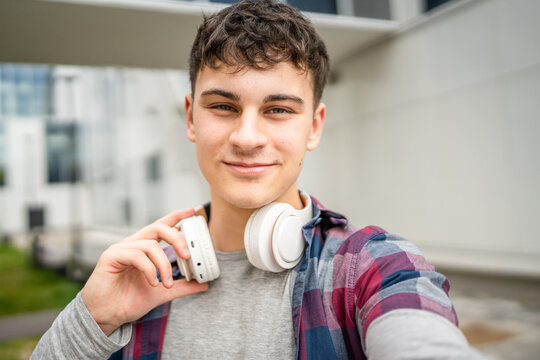 portrait of young Caucasian man teenager 18 or 19 years old outdoor