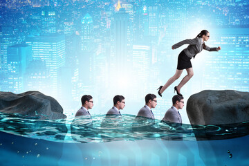 Inequal competition concept with businesswoman walking on heads