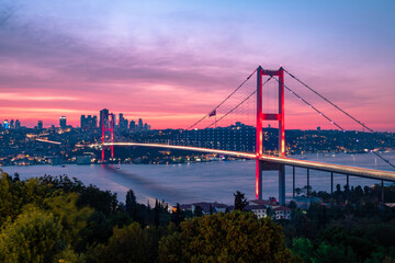 Awesome Panoramic view of Istanbul Bosphorus on sunset. Istanbul Bosphorus Bridge (15 July Martyrs Bridge. Turkish: 15 Temmuz Sehitler Koprusu). Beautiful landscape Turkey.