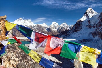 Mounts Everest Lhotse Makalu with buddhist prayer flags