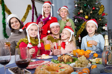 Portrait of family is posing in time celebration New Year at home