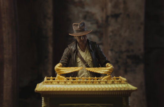 NEW YORK USA, APRIL 24 2023: Scene from Raiders of the Lost Ark where Indiana Jones discovers the Ark of the Covenant - Hasbro action figure