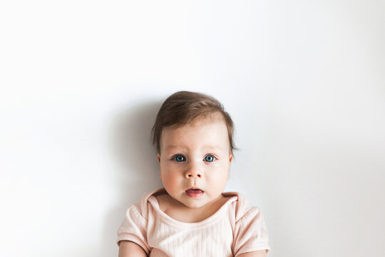 Portrait of a newborn baby with blue eyes, photo for a banner, top view. Baby photo with Copy Space For Your Text