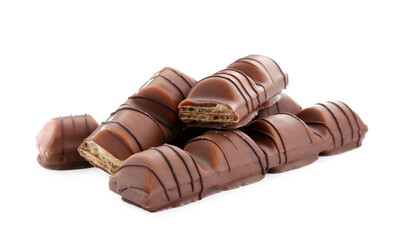 Pieces of tasty chocolate bars on white background