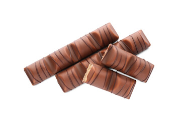 Pieces of tasty chocolate bars on white background, top view