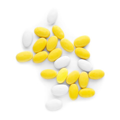 Different tasty dragee candies on white background, top view