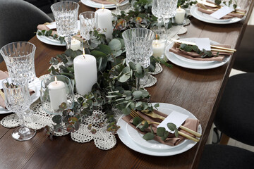Fototapeta premium Luxury table setting with beautiful decor and blank cards. Festive dinner