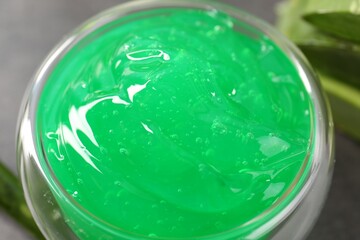 Closeup view of bowl with natural aloe gel on table