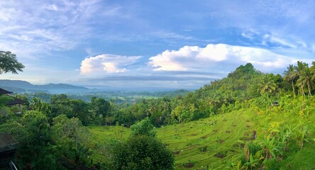 Fototapeta na wymiar Balinese hills view with blue sky