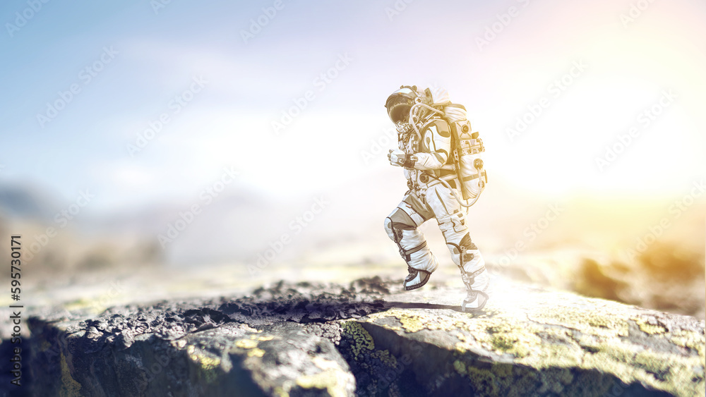 Canvas Prints astronaut walking on an unexplored planet