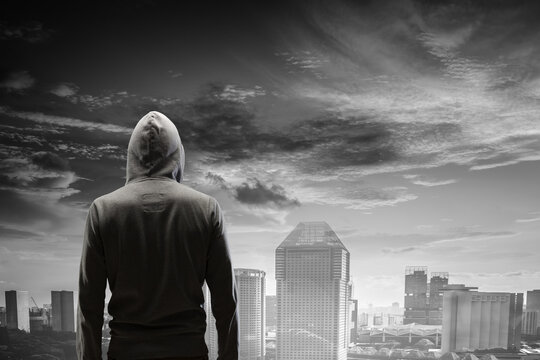 Silhouette of man in hoody