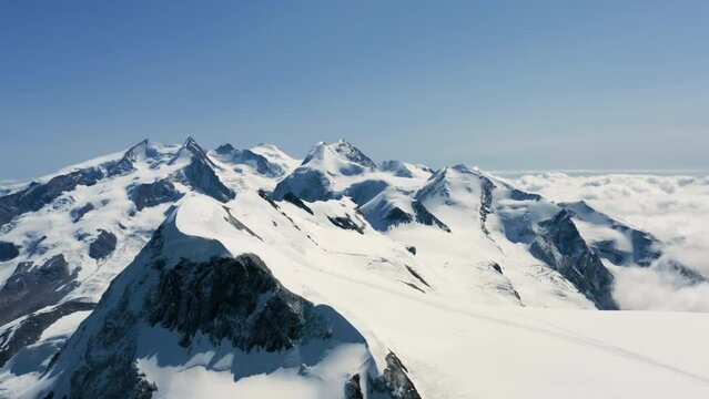 Aerial view of the Breithorn massif - is a mountain range of the Pennine Alps with its highest peak of the same name (but also called Western Summit) and located between Switzerland and Italy