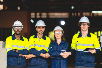 Professional industry engineer and factory foreman worker team person Wearing safety helmet hard...