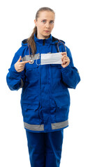 woman works on an ambulance. The rescue girl is holding a protective mask and is looking at us sternly. the doctor points a finger at the mask. isolated, white background.