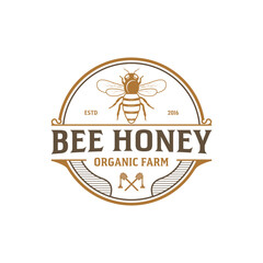 Obraz premium Honey Bee illustration and retro vintage logo vector premium 