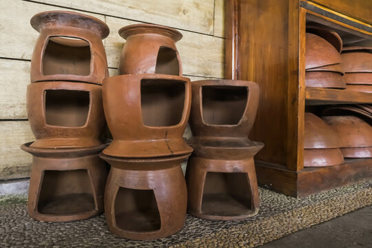 Stacked Balinese pottery and earthenware kitchen utensil. Traditional Indonesian, Bali, Javanese cookware also called gerabah or tembikar.