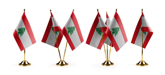Small national flags of the Lebanon on a white background