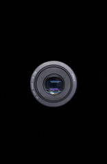 50mm lens on a black background