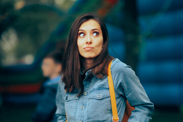Puzzled Girl Feeling Disoriented and Alone in a Public Space. Stressed woman feeling confused and...