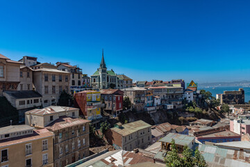 Fototapeta na wymiar Colored buildings of the UNESCO World Heritage city of Valparaiso, Chile