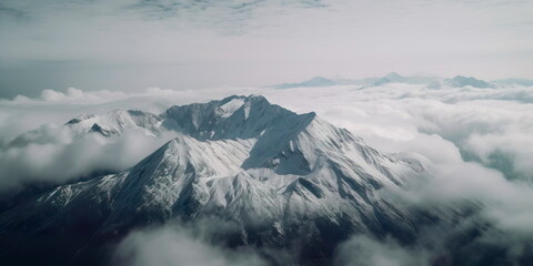 Fototapeta na wymiar aerial shot taken by drone of a majestic, snow-capped mountain range, shrouded in clouds and mist Generative AI
