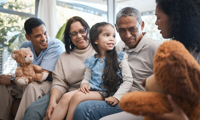Parents, grandparents and girl with teddy bear on sofa, bonding and smile for family in home living room. Men, women and female child with toys, love and happiness on lounge couch in house on holiday