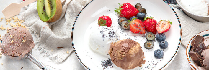 Ice cream assortment on neutral background.