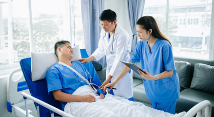 Hospital Ward Male and  Male Professional Asian Doctors Talk with a Patient, Give Health Care Advice, Recommend Treatment Plan  with Advanced Equipment