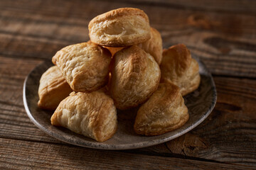 French pastry with cheese on a wooden board