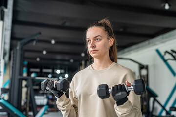 beautiful beauty who trains for health came to a beautiful spacious hall.