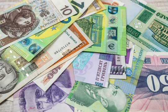 different european international money banknotes as background.
