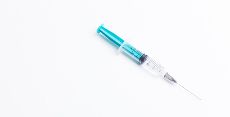 Fototapeta premium Disposable plastic syringe prepared for injection and vaccination in the hospital. The concept of medicine and health