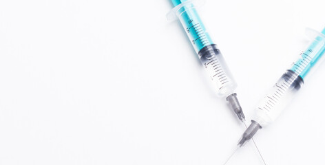 Fototapeta premium Disposable plastic syringe prepared for injection and vaccination in the hospital. The concept of medicine and health