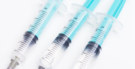 Disposable plastic syringe prepared for injection and vaccination in the hospital. The concept of medicine and health