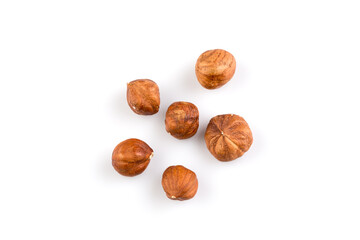 Hazelnuts on the white background
