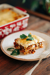 Tasty lasagna italian delicious food meals eat on the wooden dark table lyfestile still life photo