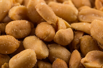 large amount of peeled salted peanuts